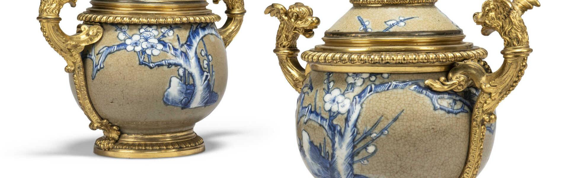 A NEAR PAIR OF RÉGENCE ORMOLU-MOUNTED CHINESE CRACKLE-GLAZED VASES AND COVERS