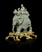 Rococo Revival. AN ORMOLU-MOUNTED CONTINENTAL PORCELAIN CELADON-GROUND MODEL OF AN ELEPHANT
