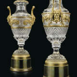 A PAIR OF LARGE FRENCH ORMOLU-MOUNTED CUT AND MOULDED-GLASS VASES - фото 1