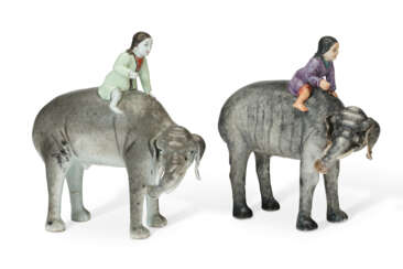 TWO CHINESE EXPORT PORCELAIN ELEPHANTS AND RIDERS