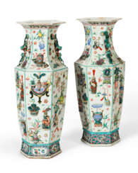 A LARGE PAIR OF CHINESE EXPORT PORCELAIN FAMILLE ROSE VASES