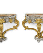 Gilding. A PAIR OF SOUTH EUROPEAN SILVER AND GILT-COPPER HANGING CONSOLES