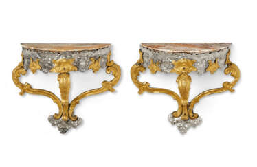 A PAIR OF SOUTH EUROPEAN SILVER AND GILT-COPPER HANGING CONSOLES