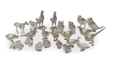 AN ASSEMBLED GROUP OF TWENTY-THREE SILVER FIGURAL CASTERS