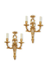 A PAIR OF LATE LOUIS XV ORMOLU TWO-BRANCH WALL LIGHTS