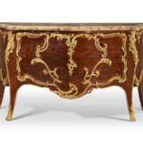 A FRENCH ORMOLU-MOUNTED MAHOGANY, BOIS SATINE, KINGWOOD AND BOIS-DE-BOUT MARQUETRY COMMODE - photo 2