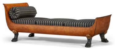 A RUSSIAN KARELIAN BIRCH, PARCEL-GILT AND EBONIZED DAYBED