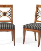 Fruchtholz. A PAIR OF AUSTRIAN INLAID FRUITWOOD AND EBONIZED SIDE CHAIRS