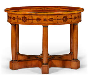 AN AUSTRIAN FRUITWOOD, MARQUETRY AND EBONIZED CENTER TABLE