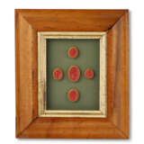 A GROUP OF THIRTEEN FRAMED SETS OF INTAGLIO SEALS AND MOLDS - photo 6