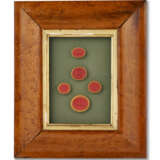 A GROUP OF THIRTEEN FRAMED SETS OF INTAGLIO SEALS AND MOLDS - photo 20