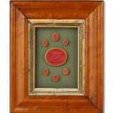A GROUP OF THIRTEEN FRAMED SETS OF INTAGLIO SEALS AND MOLDS - photo 24