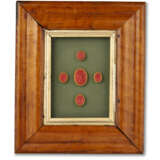 A GROUP OF THIRTEEN FRAMED SETS OF INTAGLIO SEALS AND MOLDS - photo 26
