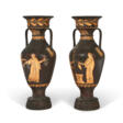 A PAIR OF CAST-IRON TWIN-HANDLED VASES - Auction archive