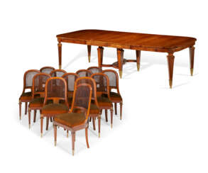 A FRENCH ORMOLU-MOUNTED MAHOGANY AND AMBOYNA DINING TABLE AND CHAIRS