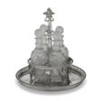 A FRENCH SILVER CRUET STAND AND FOUR CUT GLASS BOTTLES AND STOPPERS - Аукционные цены