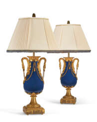 A PAIR OF FRENCH ORMOLU-MOUNTED BLUE PORCELAIN VASES, NOW MOUNTED AS LAMPS