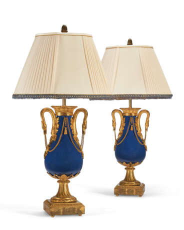 A PAIR OF FRENCH ORMOLU-MOUNTED BLUE PORCELAIN VASES, NOW MOUNTED AS LAMPS - photo 1