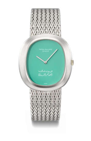 PATEK PHILIPPE. AN EXTREMELY RARE AND HIGHLY ATTRACTIVE 18K WHITE GOLD AUTOMATIC CUSHION-SHAPED WRISTWATCH WITH `PALE GREEN` DIAL AND BRACELET, MADE FOR COLONEL MUAMMAR GADDAFI - photo 1