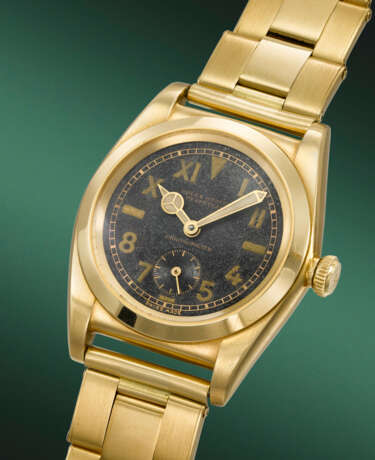 ROLEX. A RARE AND HIGHLY ATTRACTIVE 18K GOLD AUTOMATIC WRISTWATCH WITH CALIFORNIA DIAL AND BRACELET - photo 2