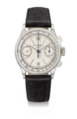 PATEK PHILIPPE. AN EXTREMELY RARE AND ELEGANT STAINLESS STEEL CHRONOGRAPH WRISTWATCH