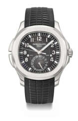 PATEK PHILIPPE. A COVETED STAINLESS STEEL AUTOMATIC DUAL TIME WRISTWATCH WITH SWEEP CENTRE SECONDS AND DAY/NIGHT INDICATOR