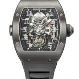 RICHARD MILLE. AN EXCEEDINGLY RARE DLC-COATED TITANIUM LIMITED EDITION SKELETONIZED DUAL TIME TOURBILLON WRISTWATCH WITH POWER RESERVE AND TORQUE INDICATORS - photo 1