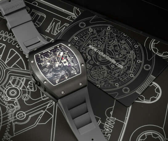 RICHARD MILLE. AN EXCEEDINGLY RARE DLC-COATED TITANIUM LIMITED EDITION SKELETONIZED DUAL TIME TOURBILLON WRISTWATCH WITH POWER RESERVE AND TORQUE INDICATORS - фото 4