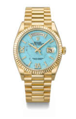 ROLEX. A RARE AND HIGHLY ATTRACTIVE 18K GOLD AND DIAMOND-SET AUTOMATIC WRISTWATCH WITH SWEEP CENTRE SECONDS, DAY, DATE, TURQUOISE DIAL AND BRACELET
