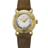 PATEK PHILIPPE. A VERY RARE AND ATTRACTIVE 18K GOLD WORLD TIME WRISTWATCH - photo 1