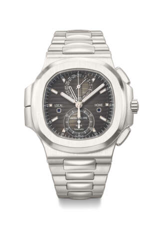 PATEK PHILIPPE. A VERY RARE AND LARGE STAINLESS STEEL AUTOMATIC FLYBACK CHRONOGRAPH DUAL TIME WRISTWATCH WITH DAY/NIGHT INDICATOR, DATE AND BRACELET - photo 1
