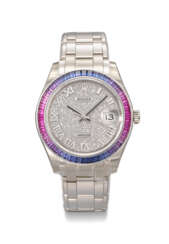 ROLEX. A RARE AND HIGHLY ATTRACTIVE 18K WHITE GOLD, DIAMOND AND MULTI-COLOURED SAPPHIRE-SET AUTOMATIC WRISTWATCH WITH SWEEP CENTRE SECONDS, DATE AND BRACELET