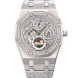 AUDEMARS PIGUET. AN EXTREMELY RARE AND HIGHLY ATTRACTIVE STAINLESS STEEL, PLATINUM AND DIAMOND-SET AUTOMATIC SKELETONIZED PERPETUAL CALENDAR WRISTWATCH WITH MOON PHASES, LEAP YEAR INDICATION AND BRACELET - Foto 1