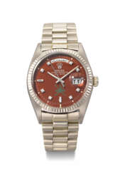 ROLEX. A VERY RARE AND HIGHLY ATTRACTIVE 18K WHITE GOLD AND DIAMOND-SET AUTOMATIC WRISTWATCH WITH SWEEP CENTRE SECONDS, ARABIC CALENDAR, OXBLOOD LACQUERED &#39;STELLA&#39; DIAL AND BRACELET, MADE FOR THE SULTANATE OF OMAN