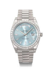 ROLEX. A RARE AND HEAVY PLATINUM AND DIAMOND-SET AUTOMATIC WRISTWATCH WITH SWEEP CENTRE SECONDS, DAY, DATE AND BRACELET