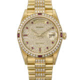 ROLEX. A VERY RARE AND HIGHLY ATTRACTIVE 18K GOLD, DIAMOND AND RUBY-SET AUTOMATIC WRISTWATCH WITH SWEEP CENTRE SECONDS, DAY, DATE AND BRACELET - photo 1