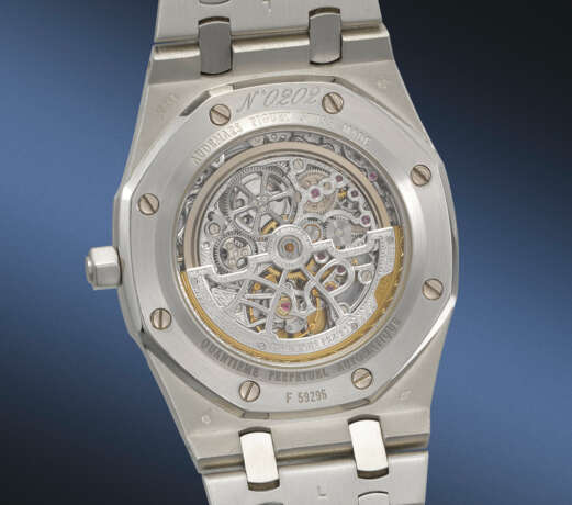 AUDEMARS PIGUET. A RARE AND HIGHLY ATTRACTIVE PLATINUM AUTOMATIC SKELETONIZED PERPETUAL CALENDAR WRISTWATCH WITH MOON PHASES, LEAP YEAR INDICATION AND BRACELET - photo 3