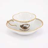 PORCELAIN CUP AND SAUCER WITH LANDSCAPE CARTOUCHES AND BASKET WEAVE RELIEF - photo 1