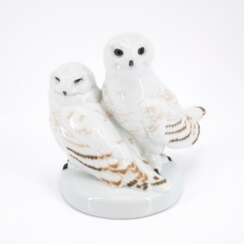 TWO PORCELAIN SNOWY OWLS