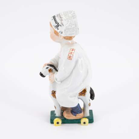 PORCELAIN HENTSCHEL CHILD WITH NEWSPAPER HAT ON TOY HORSE - фото 2