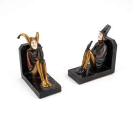 TWO BOOKENDS WITH JESTERS MADE OF STONE, BRONZE AND BONE