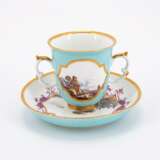 PORCELAIN BEAKER WITH DOUBLE HANDLES AND SAUCER WITH TURQUOISE GROUND AND LANDSCAPE CARTOUCHES - photo 3