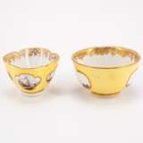 PORCELAIN CUP WITH HANDLE AND SAUCER WITH LANDSCAPE CARTOUCHES AND YELLOW GROUND & MATCHING TEA BOWL AND SAUCER WITH MERCHANT NAVY SCENES AND YELLOW GROUND - photo 4