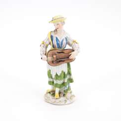PORCELAIN FEMALE MUSICIAN WITH HURDY-GURDY