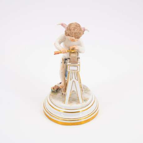 PORCELAIN CUPID HONING A GOLDEN ARROW ON A GRINDSTONE - photo 2