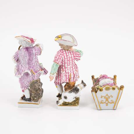 PORCELAIN CHILD FIGURINE WITH DOG, PORCELAIN CHILD FIGURINE OF A WOODCUTTER AND A PORCELAIN CRADLE WITH INFANT - photo 3