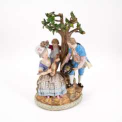 PORCELAIN ENSEMBLE OF TREES WITH FEMALE LUTE PLAYER, CHILD AND GALLANT GENTLEMAN