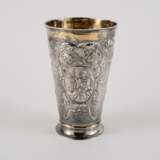 SILVER BEAKER WITH FIGURAL DEPICTION AND LAVISH RELIEF DECOR - photo 3