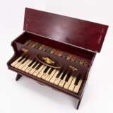 TOY PIANO MADE OF WOOD, BRASS AND PLASTIC AND A DOLL'S COOKING STOVE MADE OF SHEET METAL WITH ENAMEL DECOR - фото 5