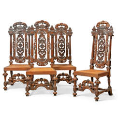 A SET OF FOUR WILLIAM AND MARY WALNUT SIDE CHAIRS